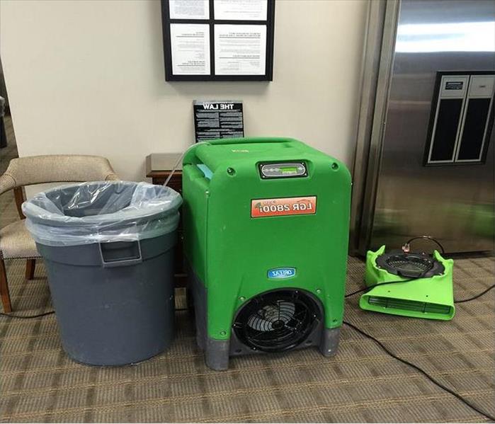 lgr dehu, trash container and snouted air mover in an office